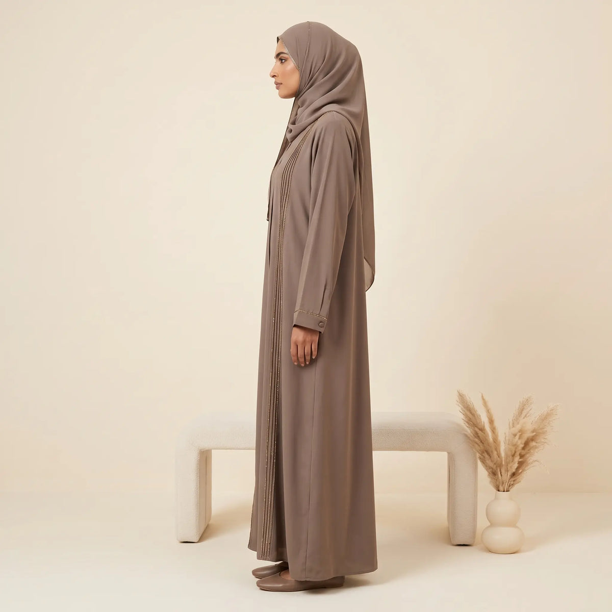 Classic Pleated Bead Trim Front Open Abaya in Dusty Rose – seated view
